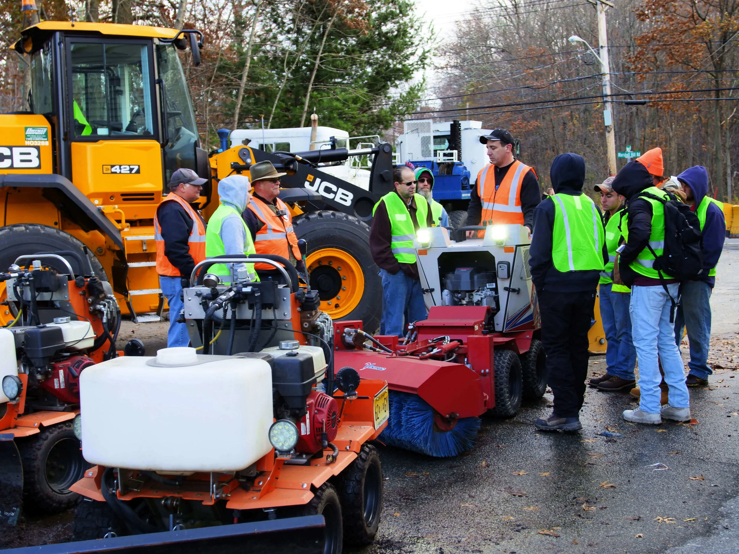 SnowX Team Members Train with Sidewalk Equipment.jpg