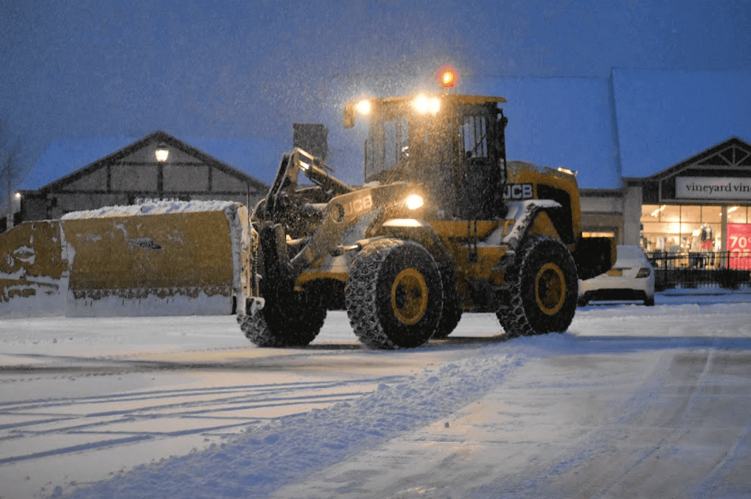 JCB Wheel Loader with Metal Pless Blade Plows Snow.png