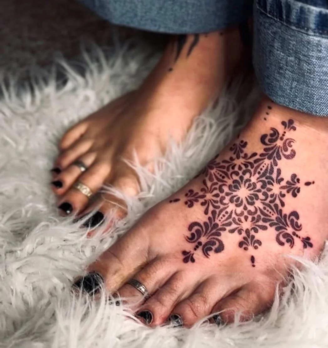 An intuitive foot tattoo by Taylor Elizabeth in Colorado