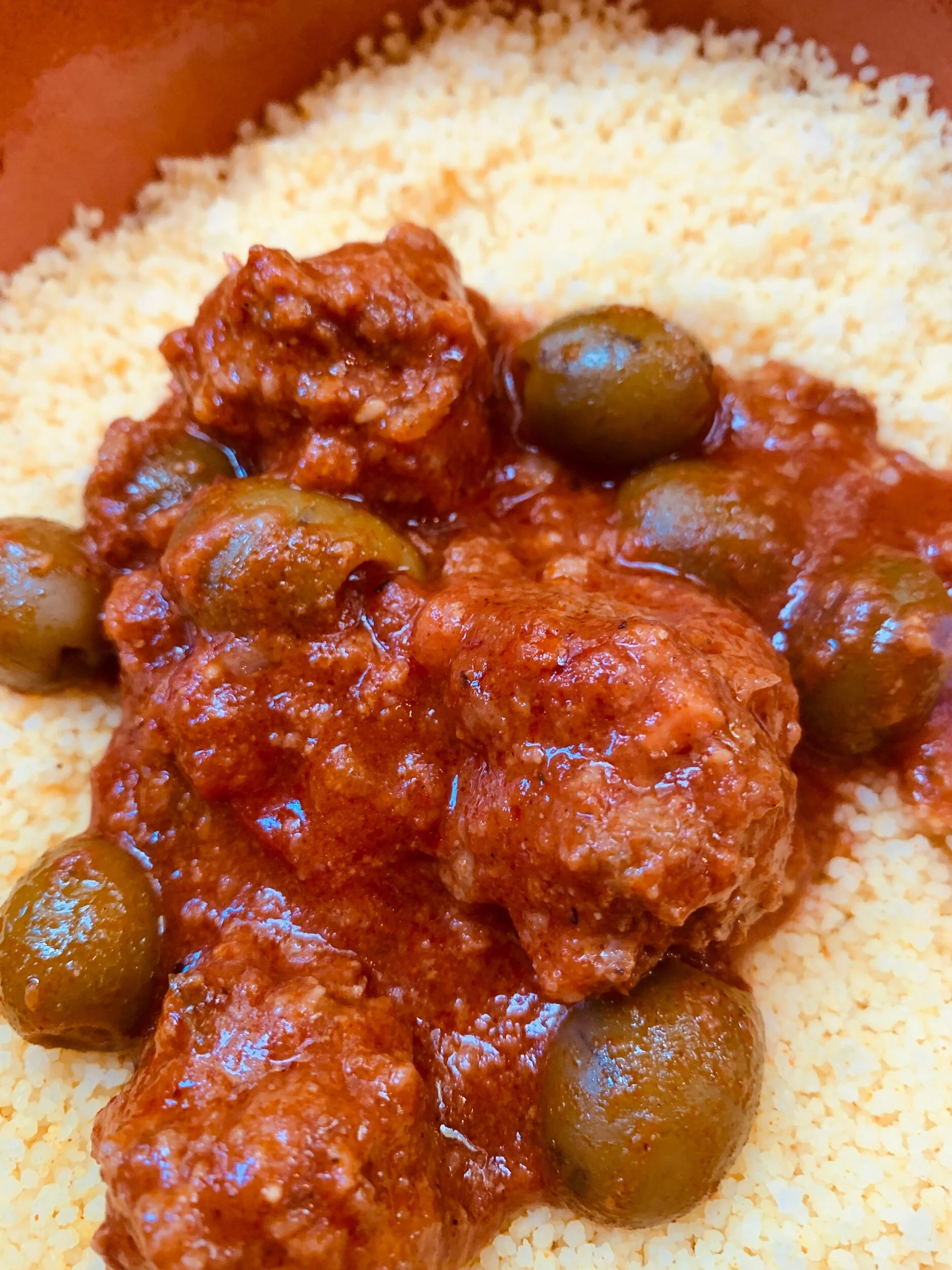 Mini meatballs and olives in tomato sauce