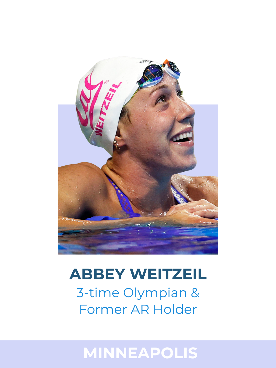 Photograph of Abbey Weitzeil, a female swimmer, wearing a swim cap and goggles, smiling and resting her chin on her arm in the pool.