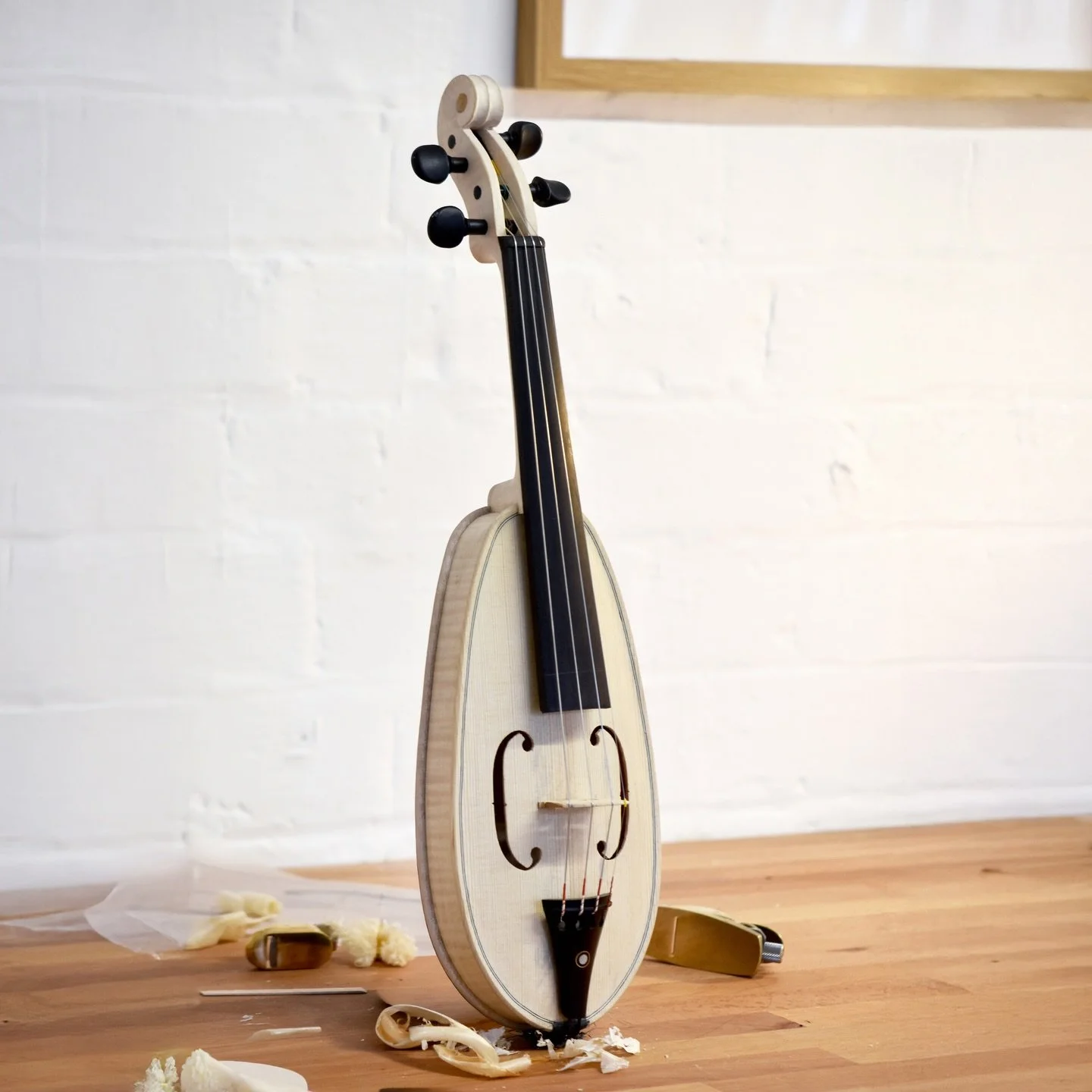 The pochette I&rsquo;ve been working on is officially up and playing! I decided to string it up in the white to see how it was sounding.

It took a little getting used to, but I&rsquo;m really pleased with it given its tiny size. At just 50.5 cm long