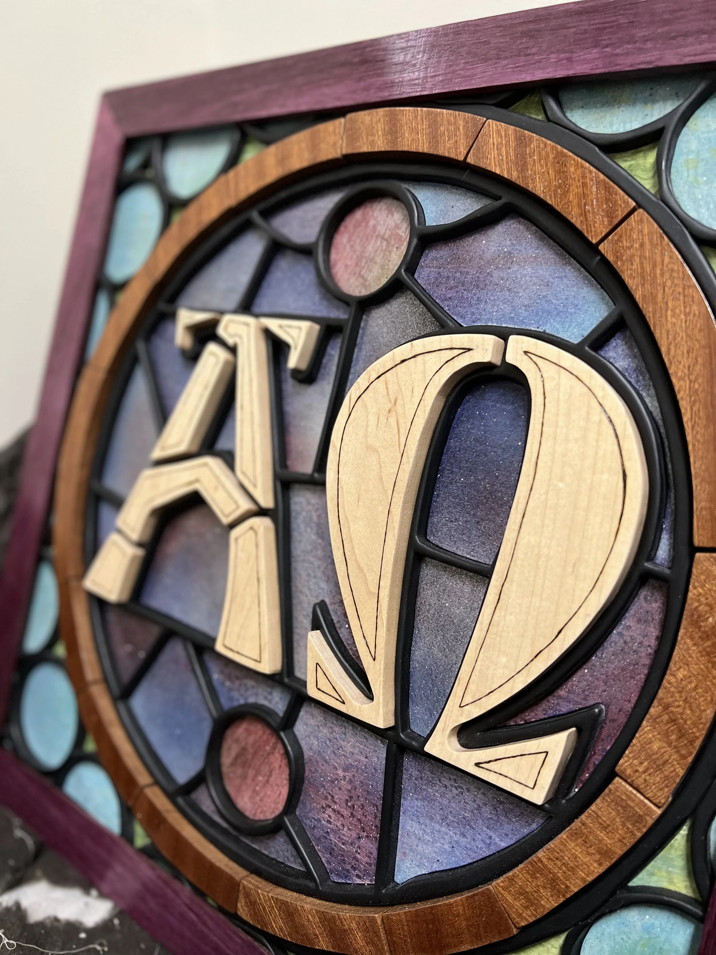 Alpha Omega. Custom design. Maple, Sapele, purple heart, plywood, mdf.