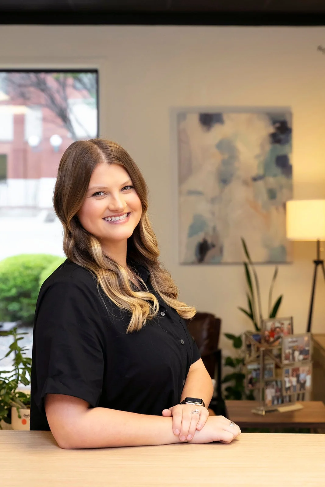 Samantha Hall smiling inside wearing a black shirt