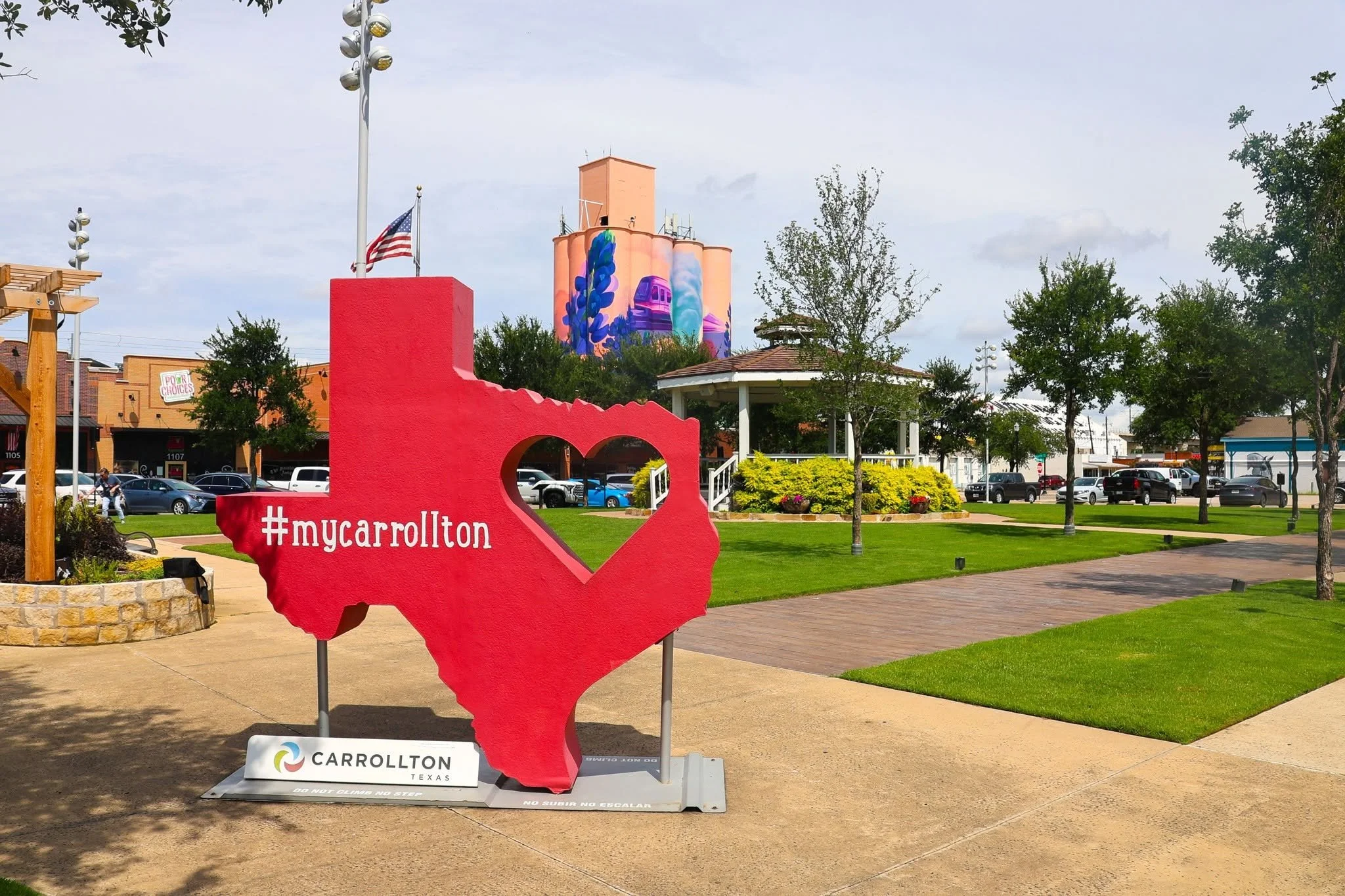 Carrollton skyline with large read heart that says #MyCarrollton