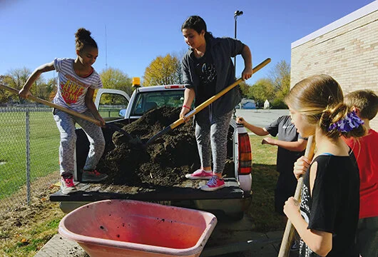 Shoveling compost