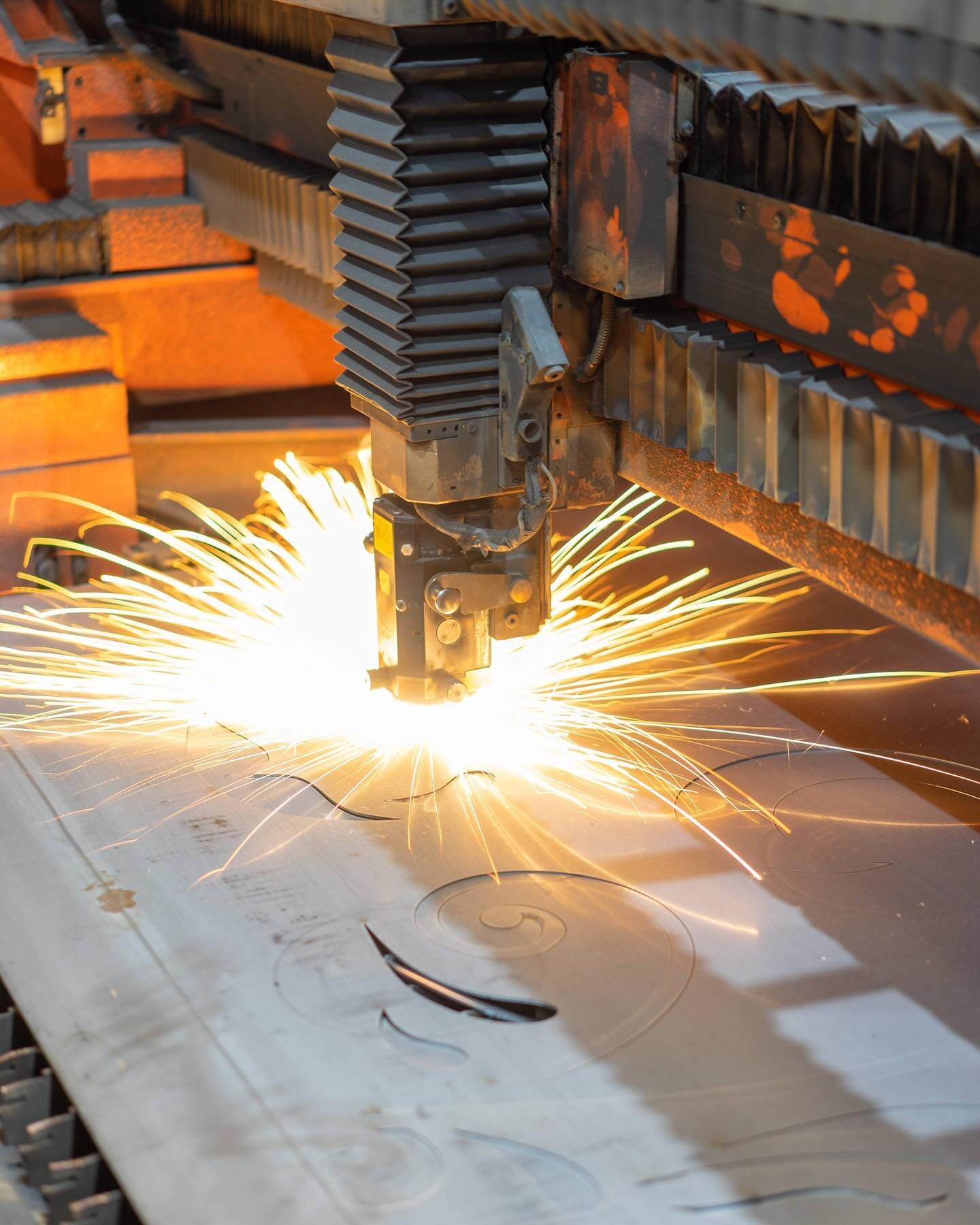 The laser in action! Making a sheet of steel turn into something magical.