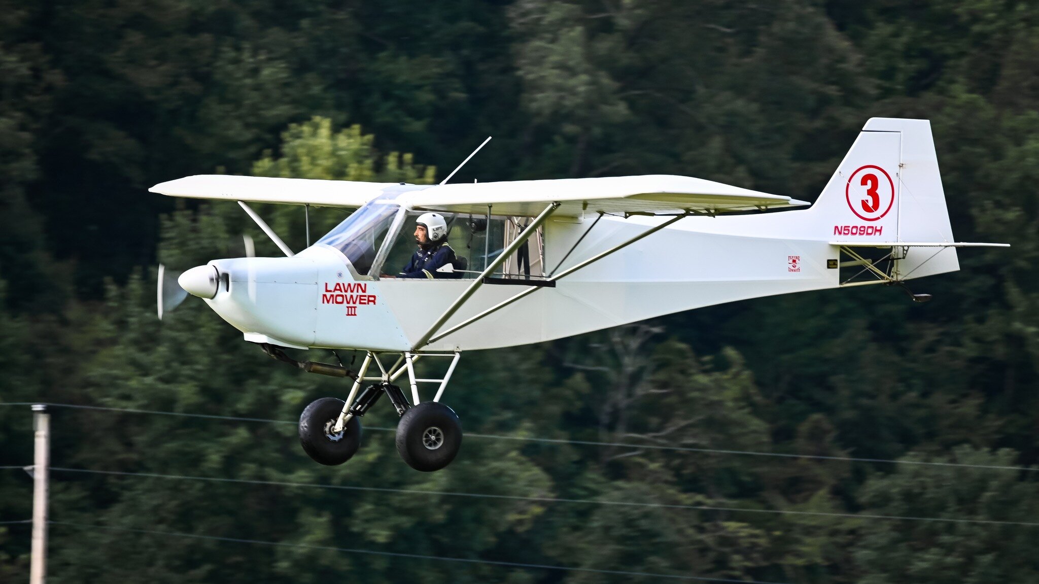 Hal Stockman running the Arkanstol course in 2021 in the Lawn Mower III. 

What is Arkanstol? A three runway drag race with simulated obstacles and a measured STOL landing at the end. Talk about an adrenaline rush. Come see the event Sep 27 - Oct 1 a