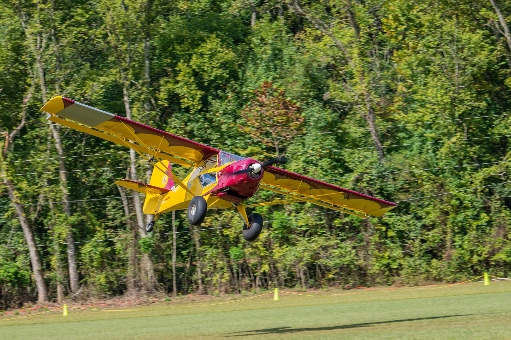 Jared Jestice coming in on final at Arkanstol at @byrdsadventurecenter in his Kitfox IV. 

What is Arkanstol? A timed STOL competition across three runways at Byrd's Adventure Center here in the Ozark Mountains of Arkansas. We have simulated obstacle