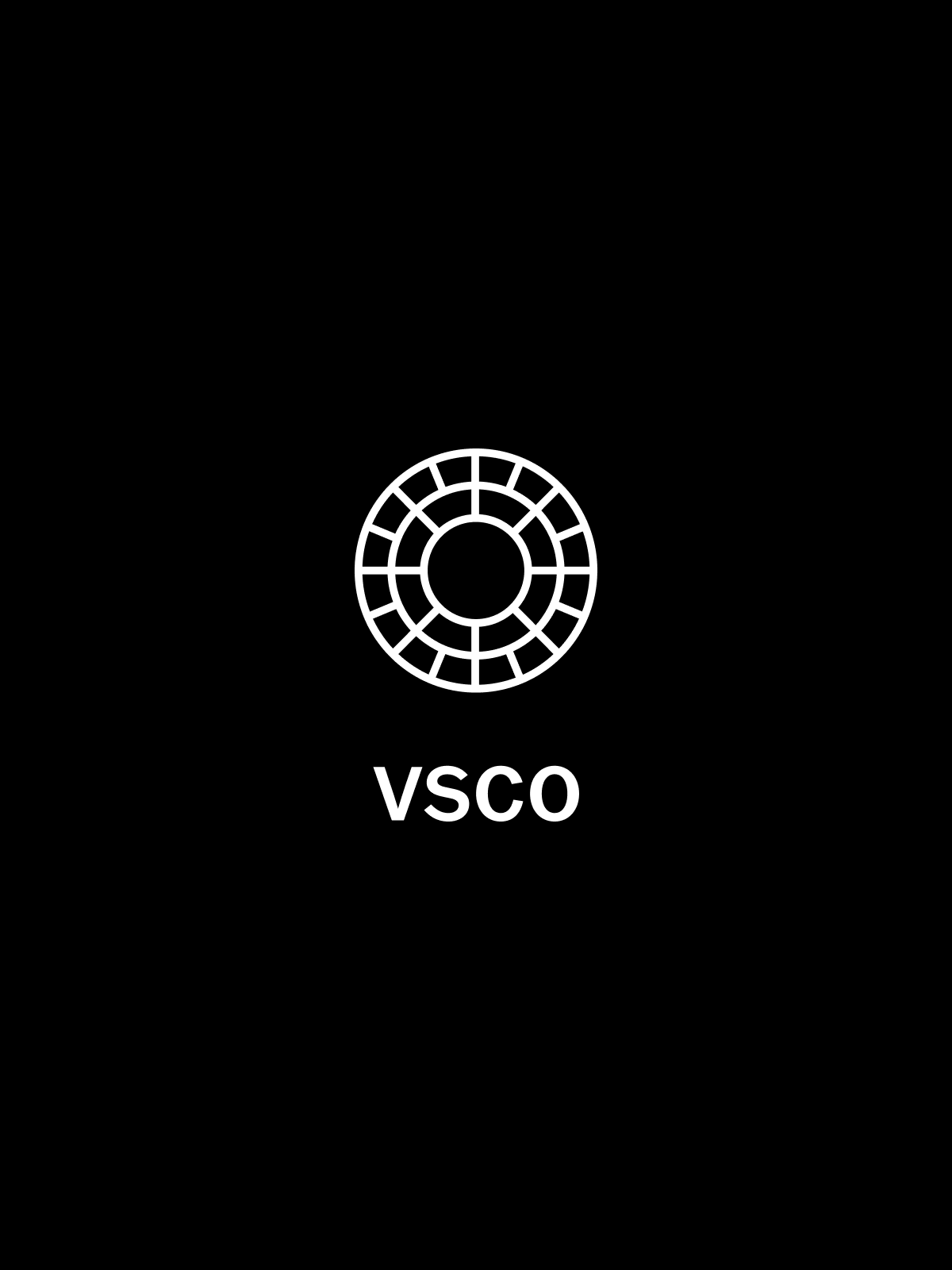 Black background with a white circular graphic and the word 'VSCO' underneath.