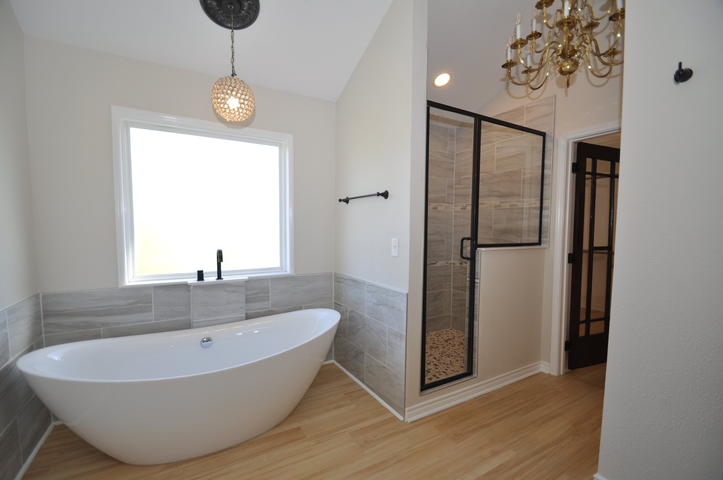 Your personal spa experience with top of the line soaking tub and quality custom built tiled shower