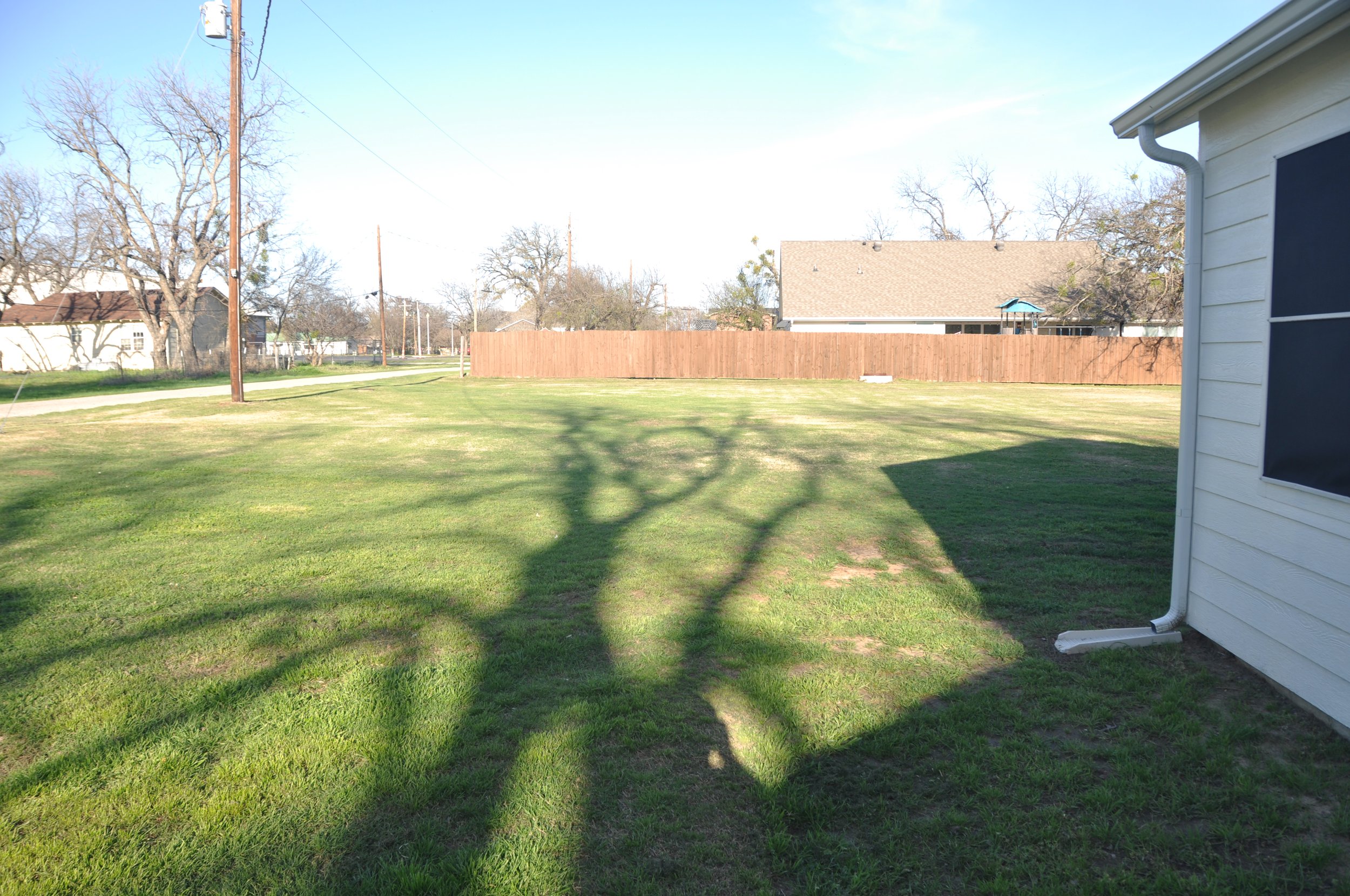 Please note: This view also shows the adjacent 100x100' lot. Available for $60,000 - below market price- to the buyer of the home.