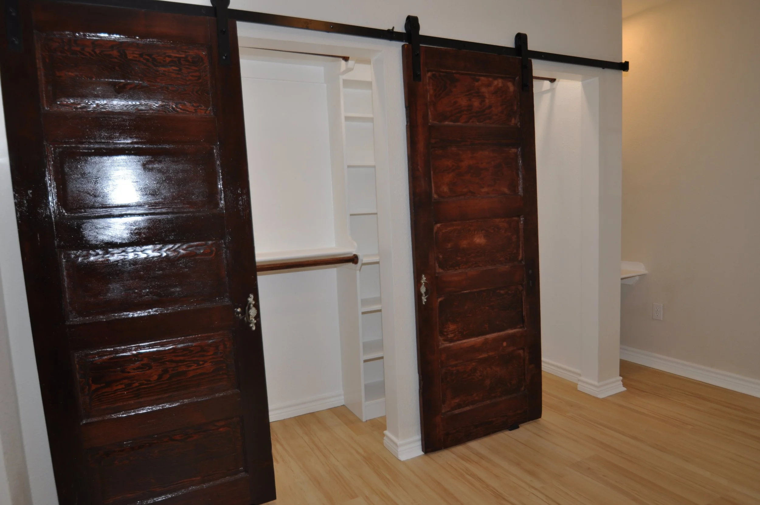 We used reclaimed solid wood doors for the closet.