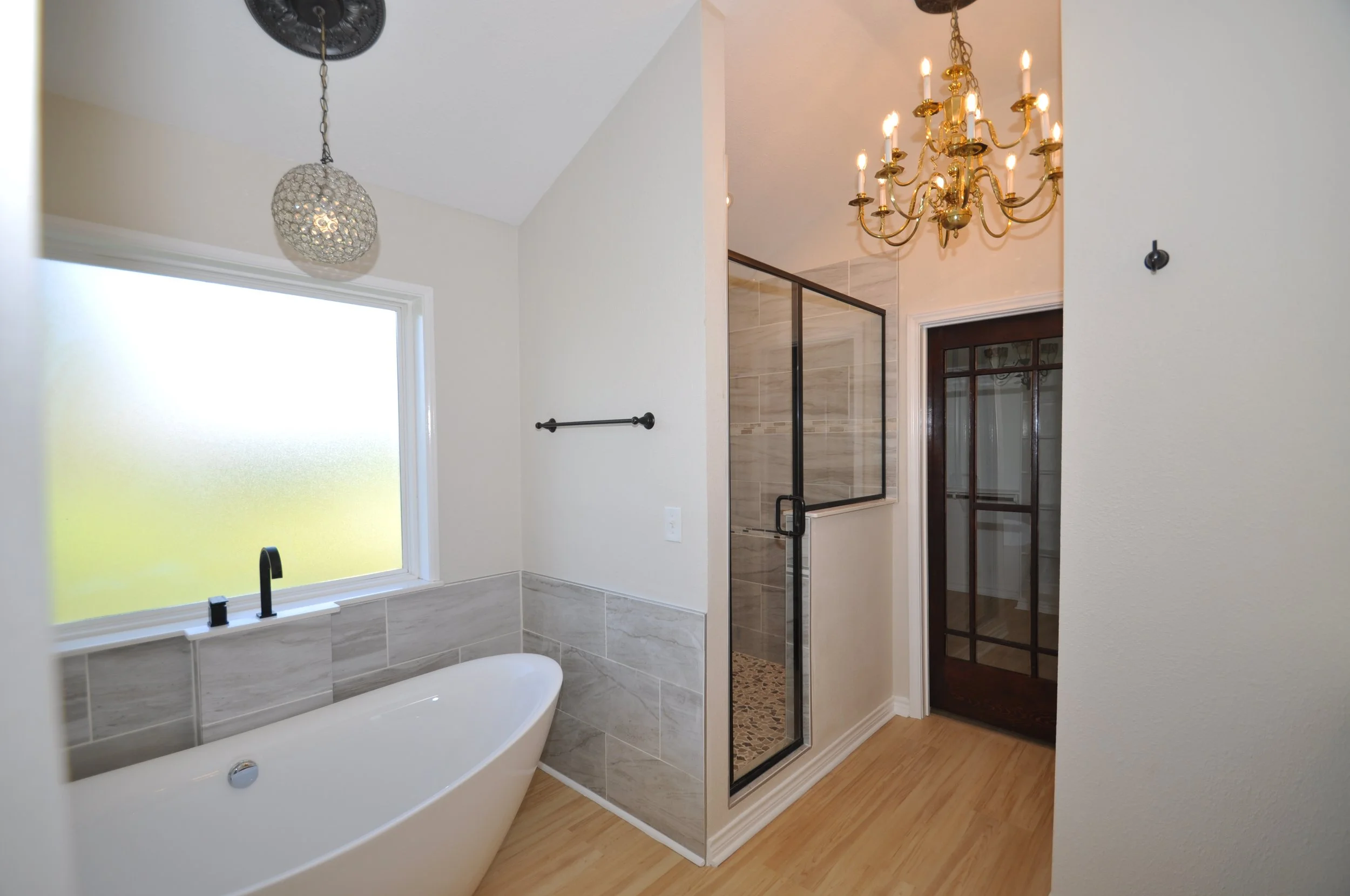 Vintage lighting in master bathroom