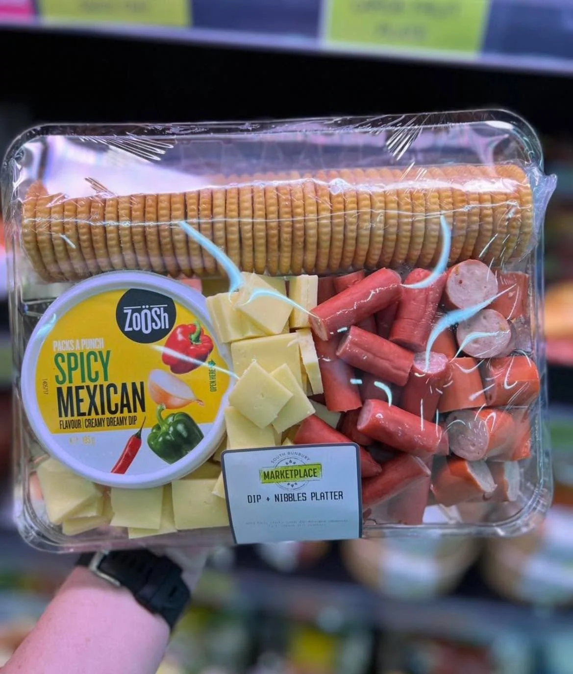 Needing snacks for the footy this arvo? 
Crackers, cheese, cabanossi, and a bold spicy dip. That's your next snack sorted.

Grab our Dip + Nibbles Platter featuring creamy "Spicy Mexican" dip, crunchy crackers, tasty cheese cubes, and savor