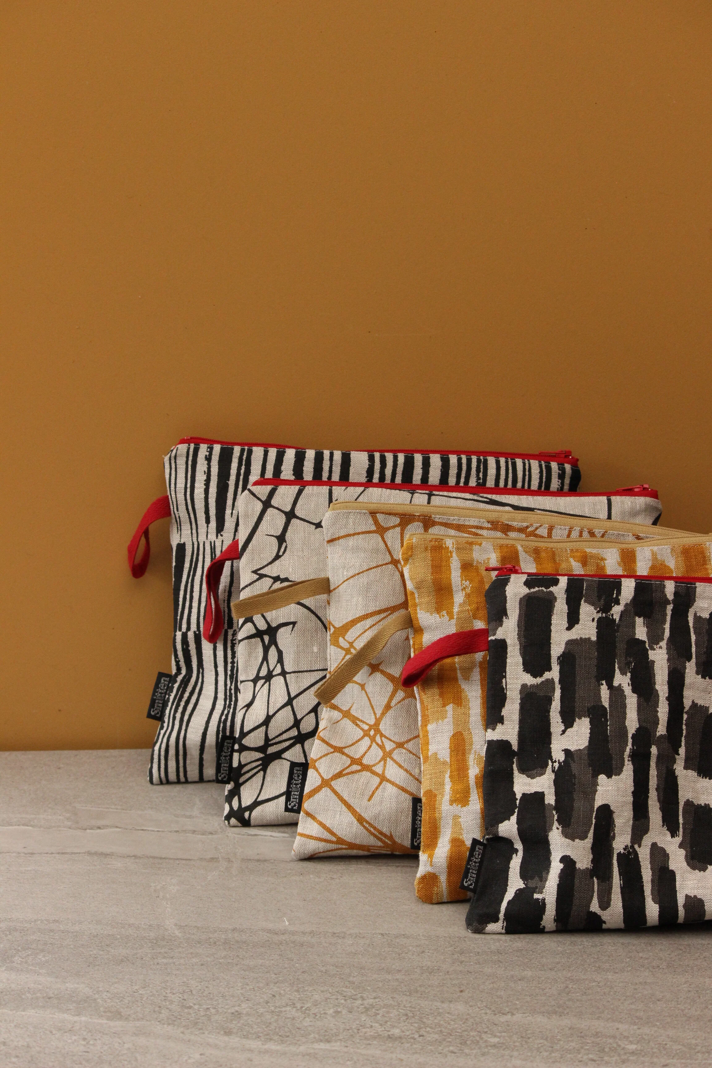 Linen toiletry bag collection by smitten textile design