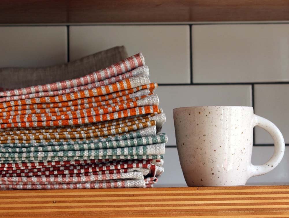 Linen tea towel coloured stack.jpg
