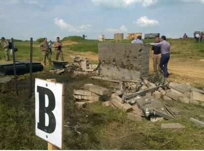 ProtectiFlex is the only wall left standing with minor damage to the face of the wall but no spalling.