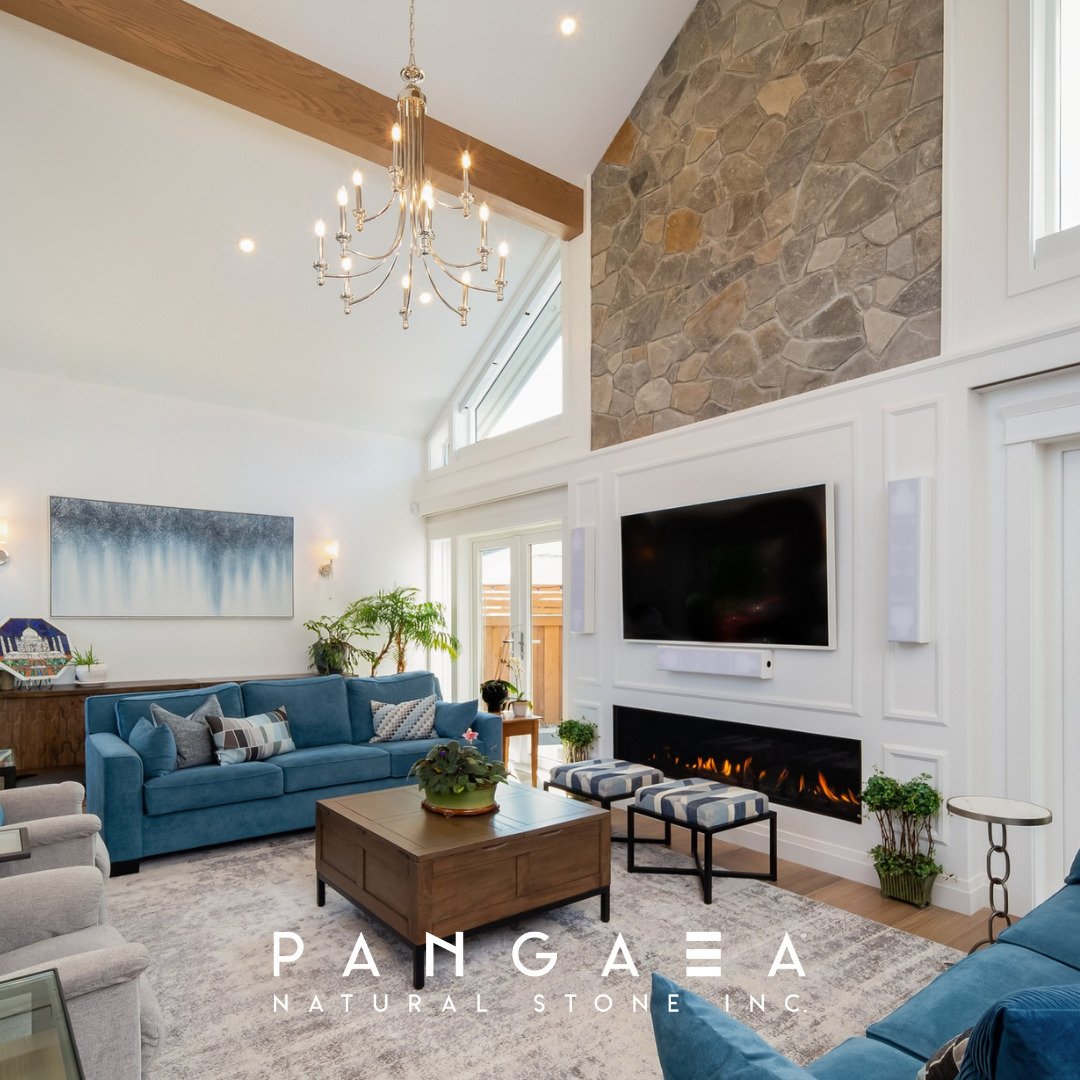 Here's an example of design dreams come to life! Massive shout out to Sarah Gallop Designs for turning this living room into a masterpiece with our Sierra Ridge Fieldstone. High ceilings, cozy vibes, and a touch of natural beauty &ndash; what more co