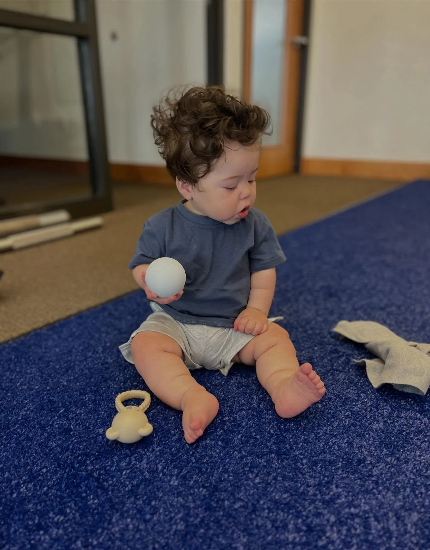 Myles checking out the clinic and helping mom and dad put together some new equipment on this beautiful Sunday! 🩵😊 He&rsquo;s got his Refuge blue on! 😍