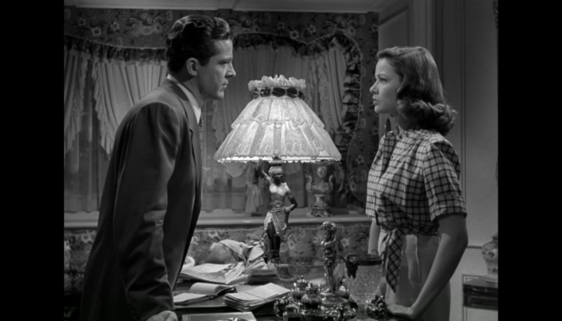 image of gene tierney and dana andrews in Laura (1944)