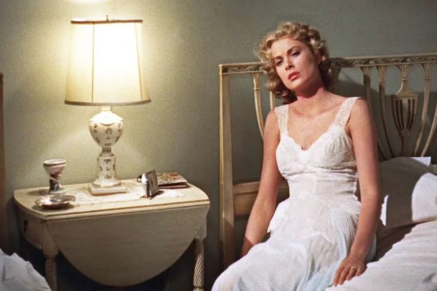 Grace Kelly wearing a negligee in the Hitchcock movie Dial M for Murder