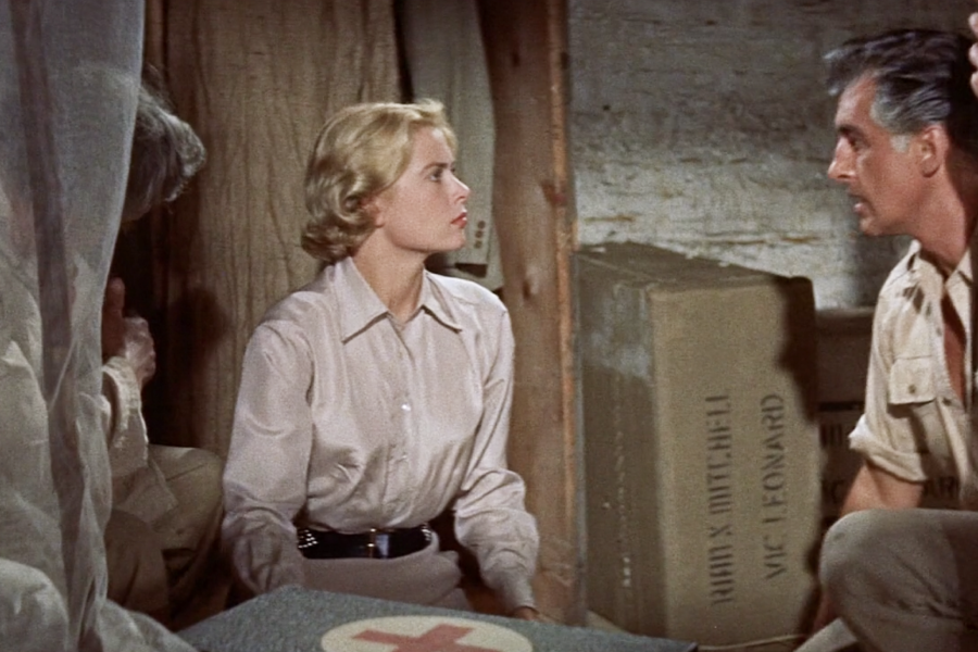 Love this Grace Kelly look! The silk blouse combined with the tan high-waisted slacks looks so classy.