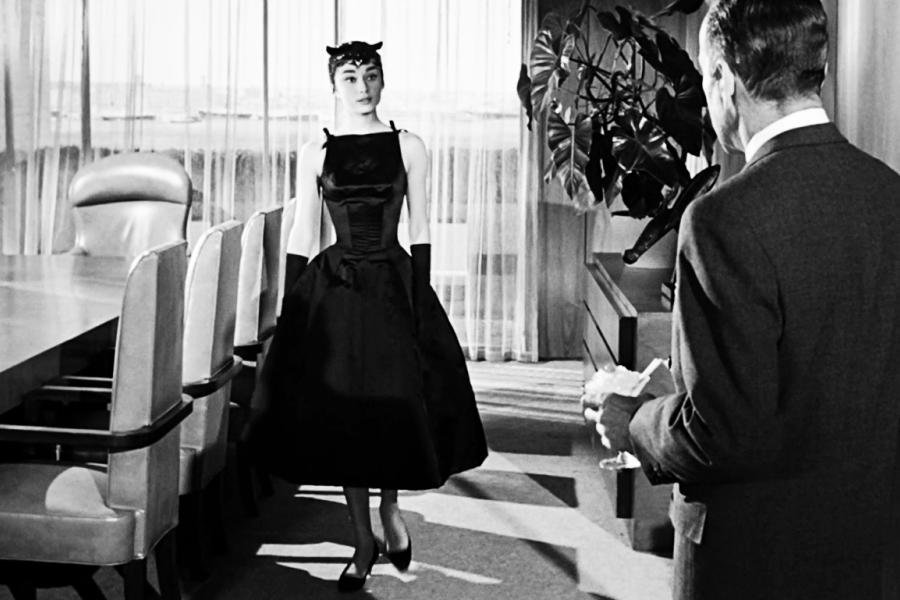 Audrey Hepburn wearing a black dress in Sabrina
