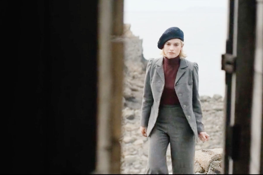Image of Lily James wearing a 1930s pantsuit in the movie "Rebecca"