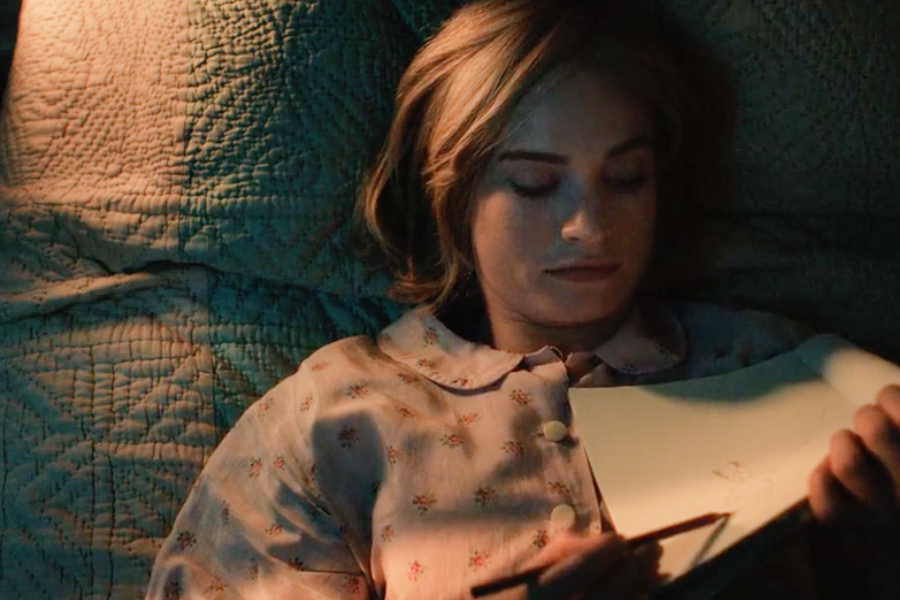 Image of Lily James wearing 1930s pajamas in the movie "Rebecca"