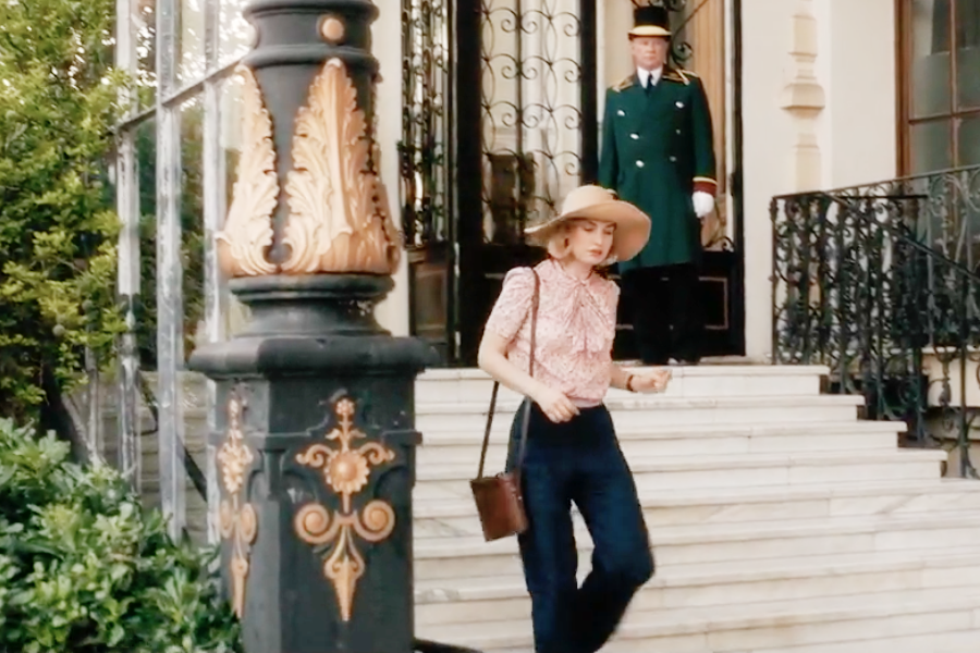 Image of Lily James wearing a 1930s hat and blouse and pants in the movie "Rebecca"