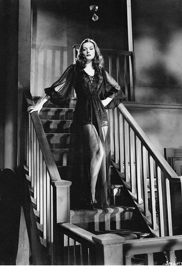 images of Hazel Brooks wearing a 1940s lingerie in the film noir Sleep My Love