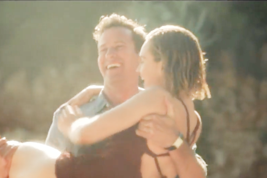 Image of Lily James wearing a 1930s swimsuit in the movie "Rebecca"