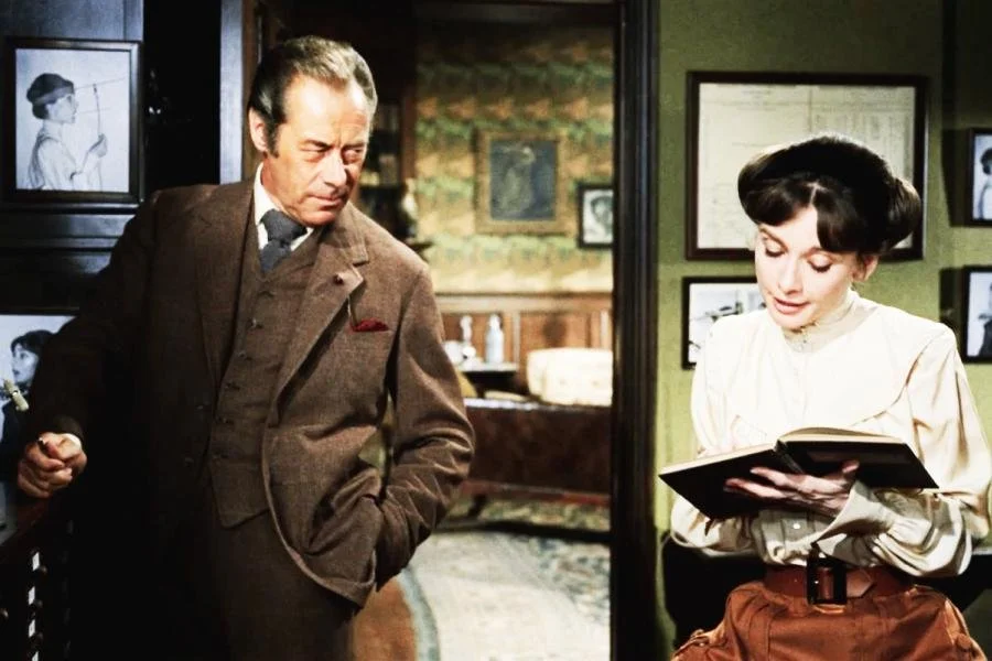 audrey hepburn wears a white blouse and brown skirt in my fair lady