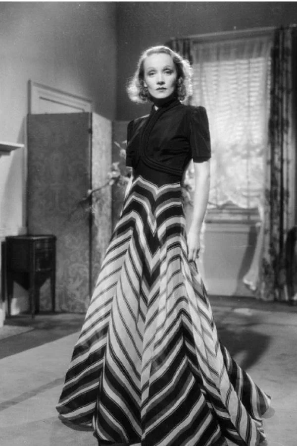 Image of Marlene Dietrich wearing a 1930s evening gown