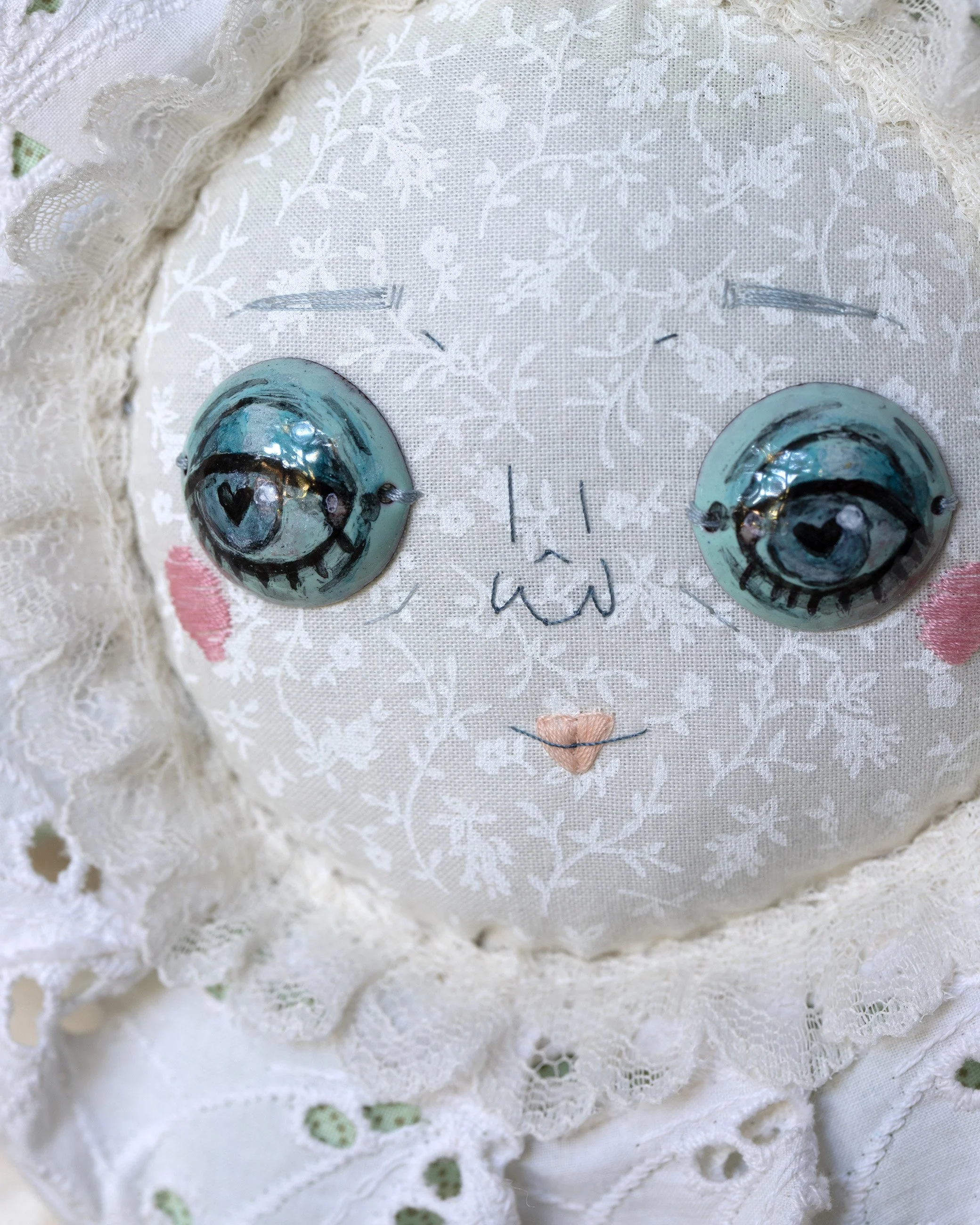 detail of teal flower baby