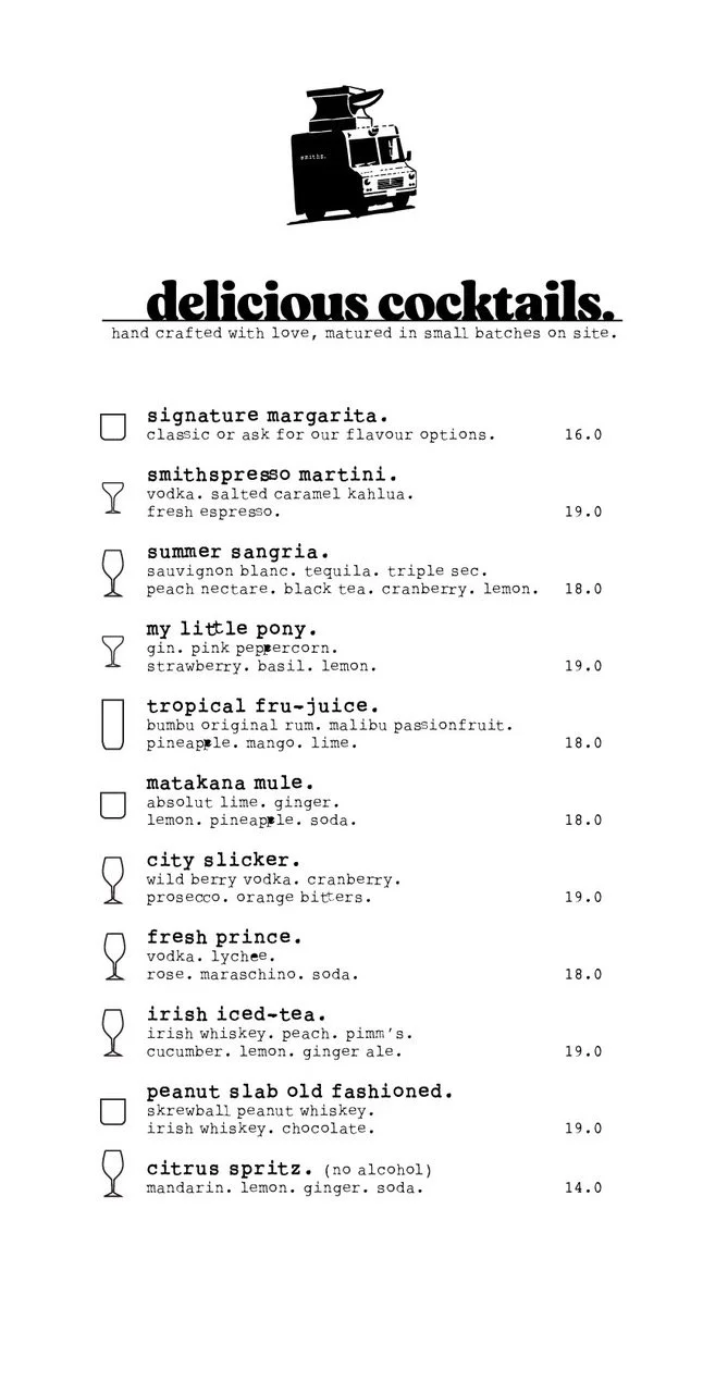 A black and white menu for a cocktail bar called Delicious Cocktails, featuring various handcrafted cocktails with ingredients and prices, with a vintage food truck illustration at the top.