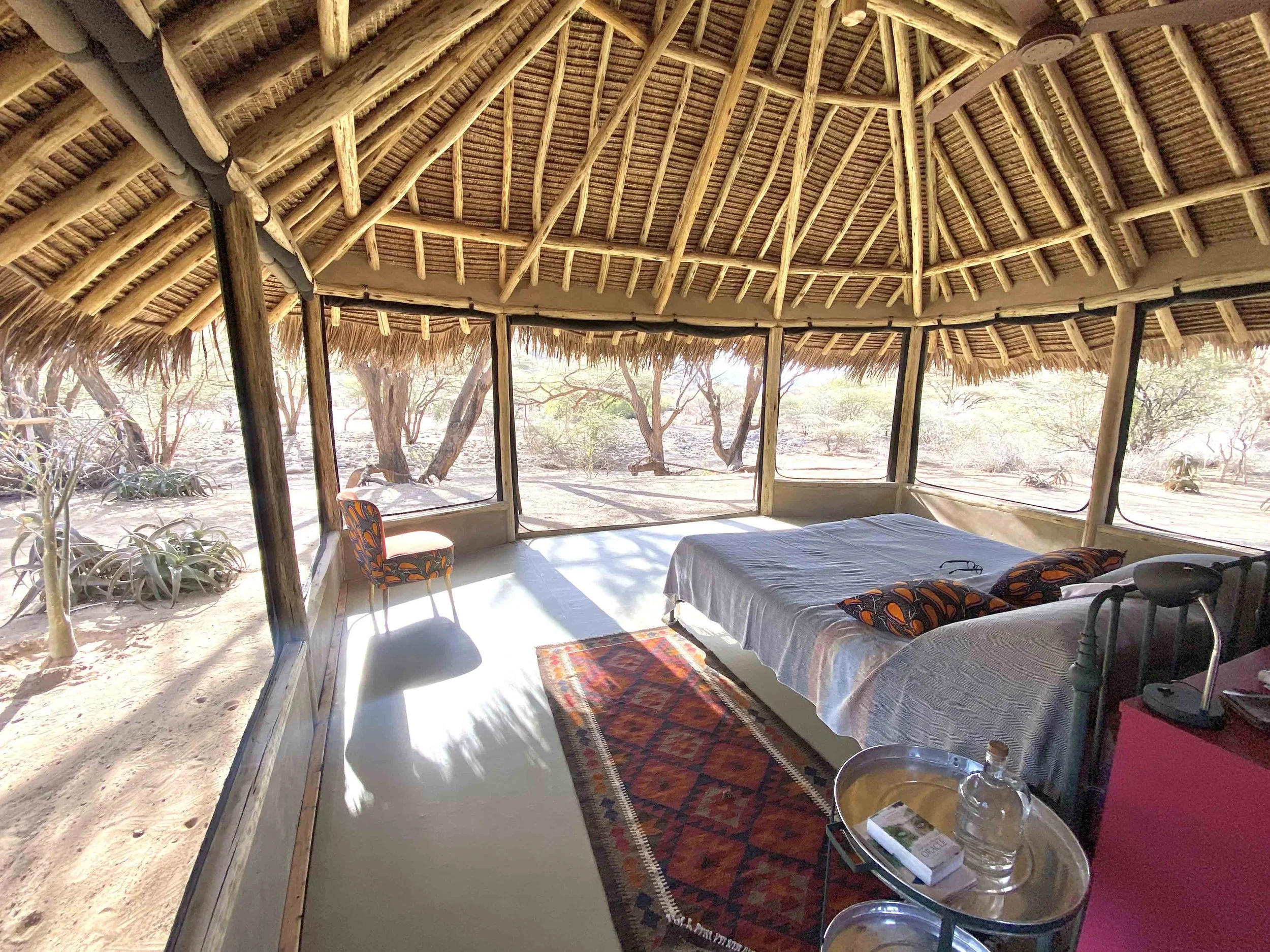 Open-sided guest room at Koros Camp in northern Kenya overlooking the surrounding wilderness