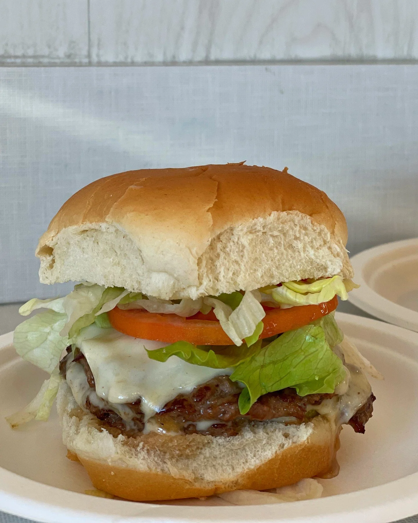 Double cheeseburger with lettuce and tomato 🍔 Get it your way with everything your heart desires!