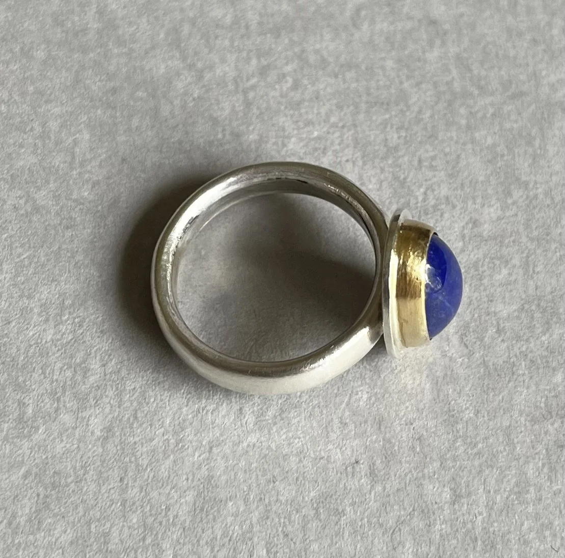 Silver with lapis in 18ct gold setting, size N
