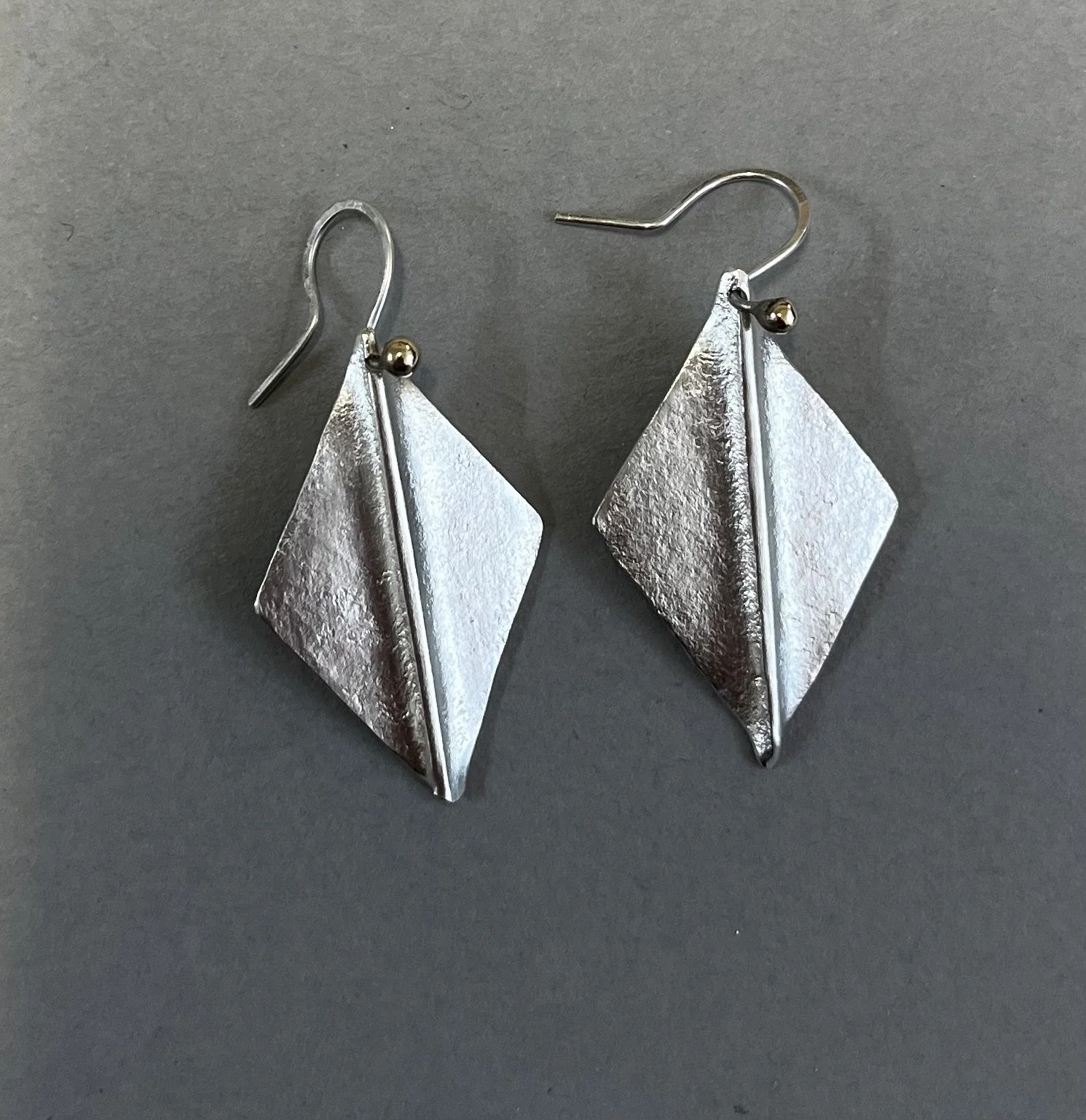 Textured, folded silver with 9ct gold beads