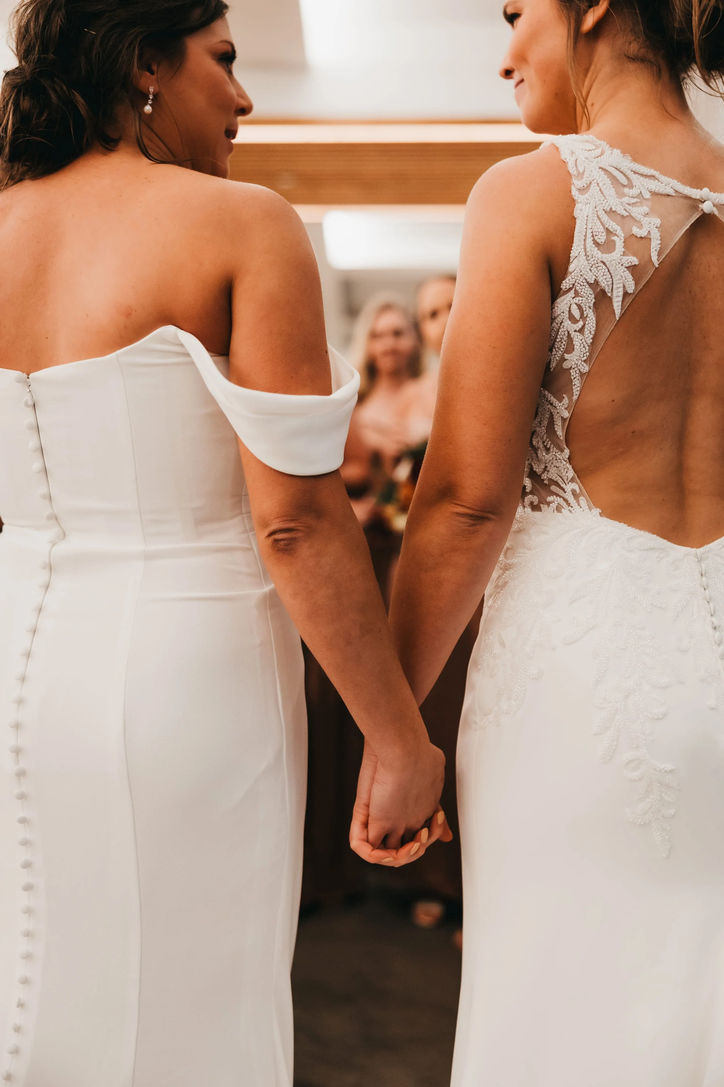 back-view-brides-holding-hands-nisswa-mn.jpg.jpg