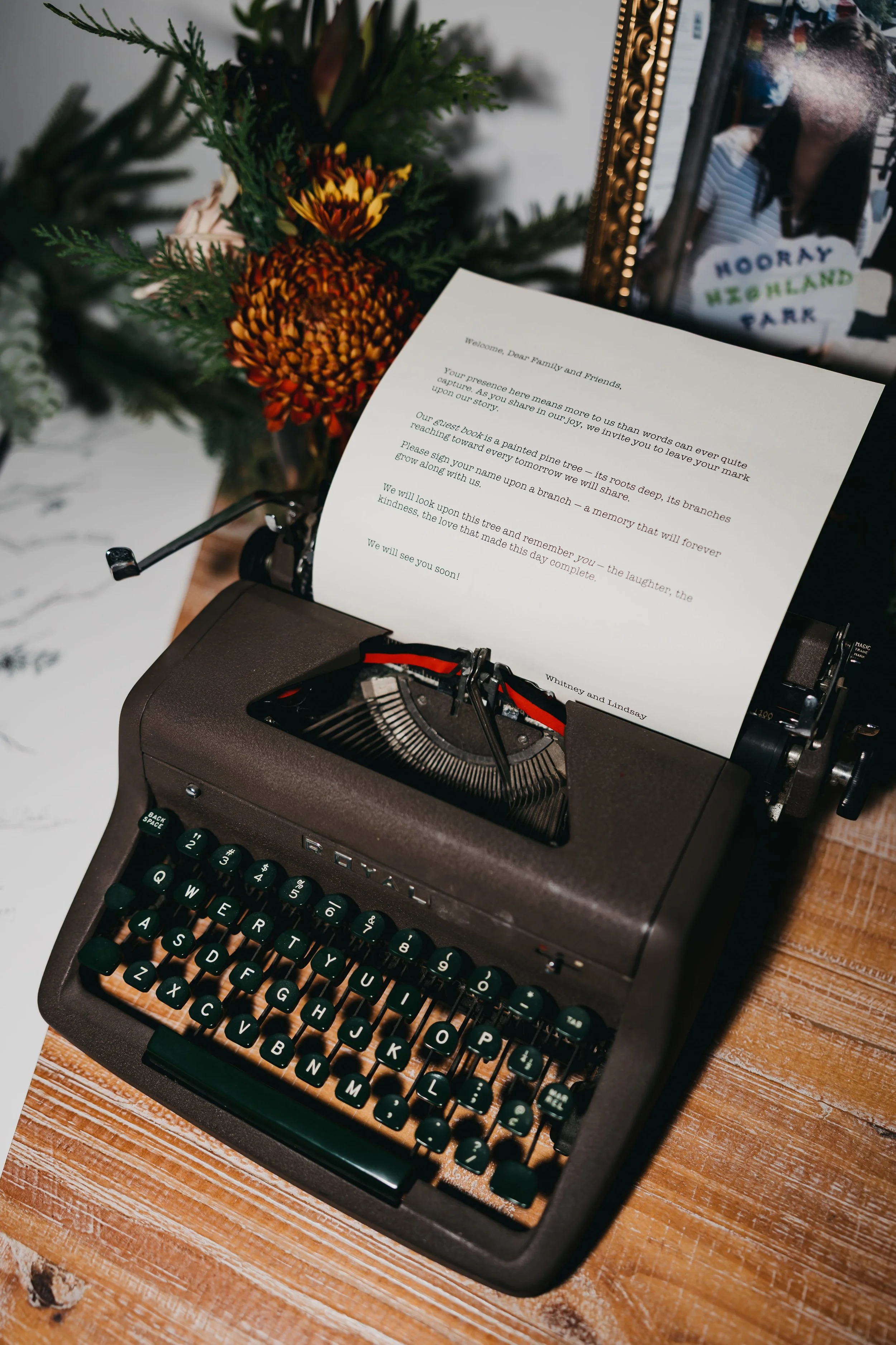 Vintage typewriter with a typed thank-you message displayed during cocktail hour at a Nisswa, Minnesota wedding.