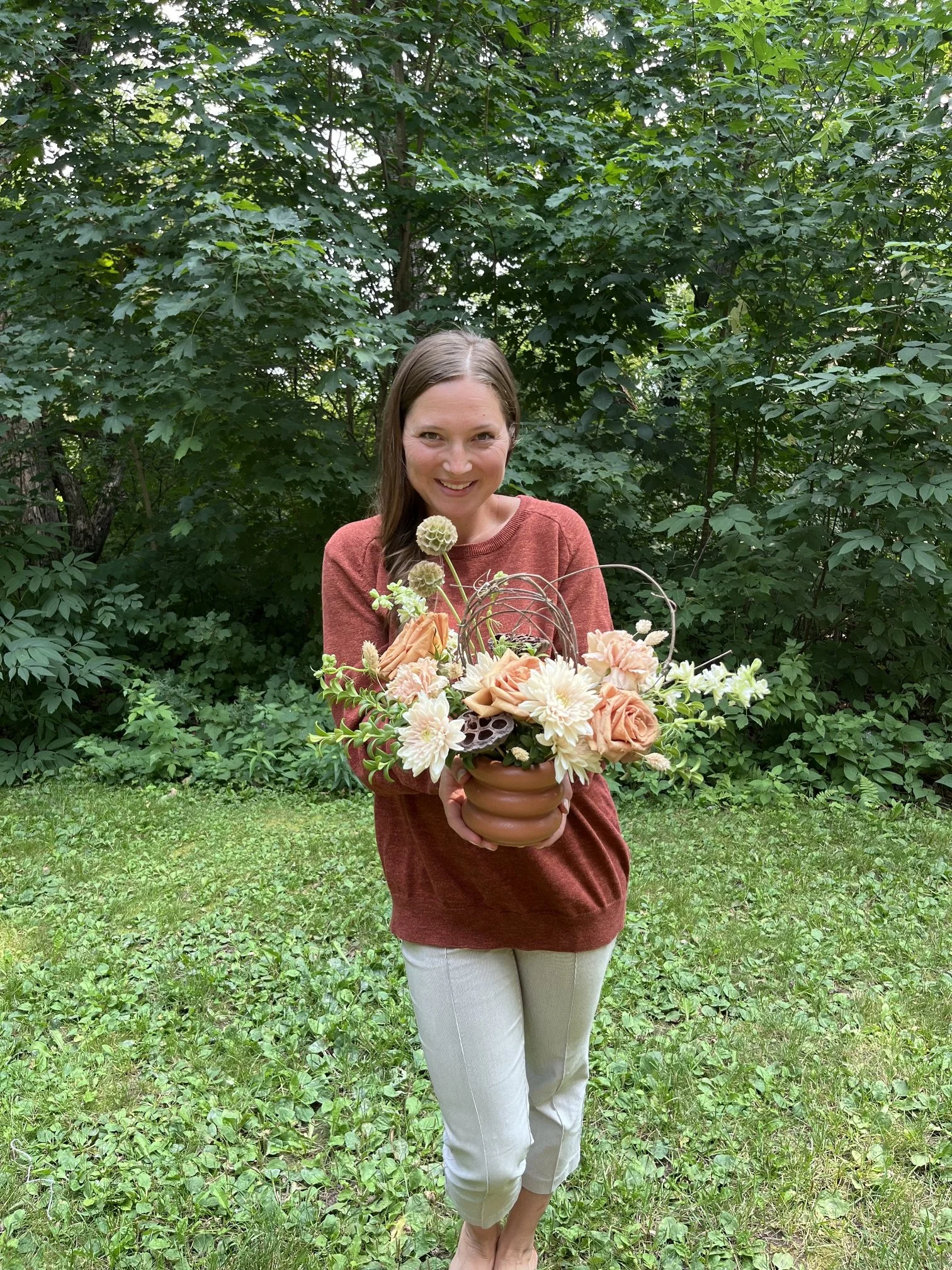 florist-holding-thanksgiving-centerpiece-duluth-mn.jpg.jpeg