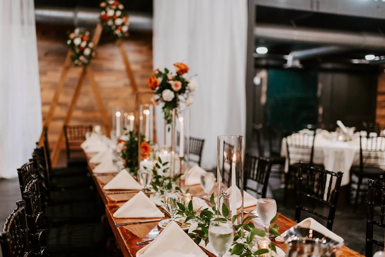 wedding-party-head-table-florals-candles-triangle-arches-duluth.jpeg.jpg