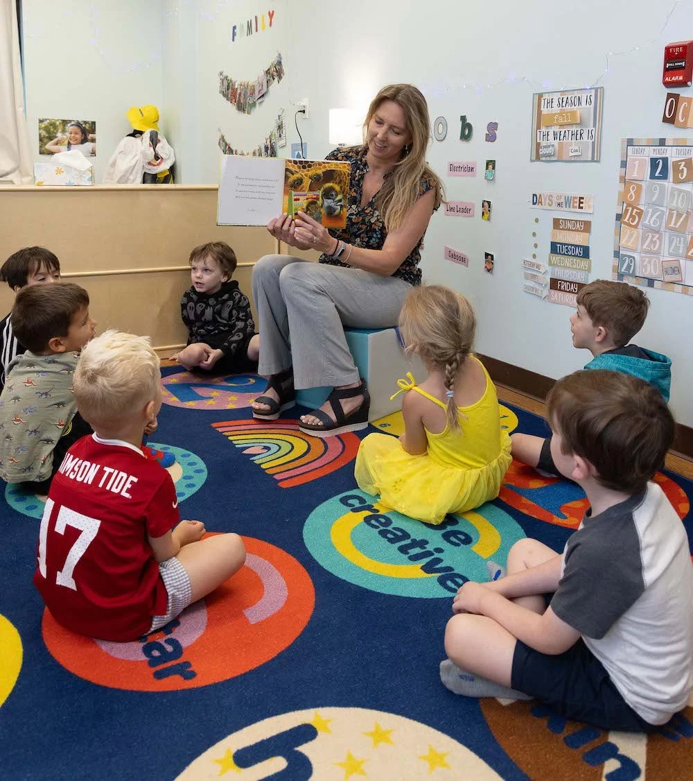 Owner and Director Autumn Zellner reads to a classroom at STARS Early Learning Academy in Fairhope, AL.