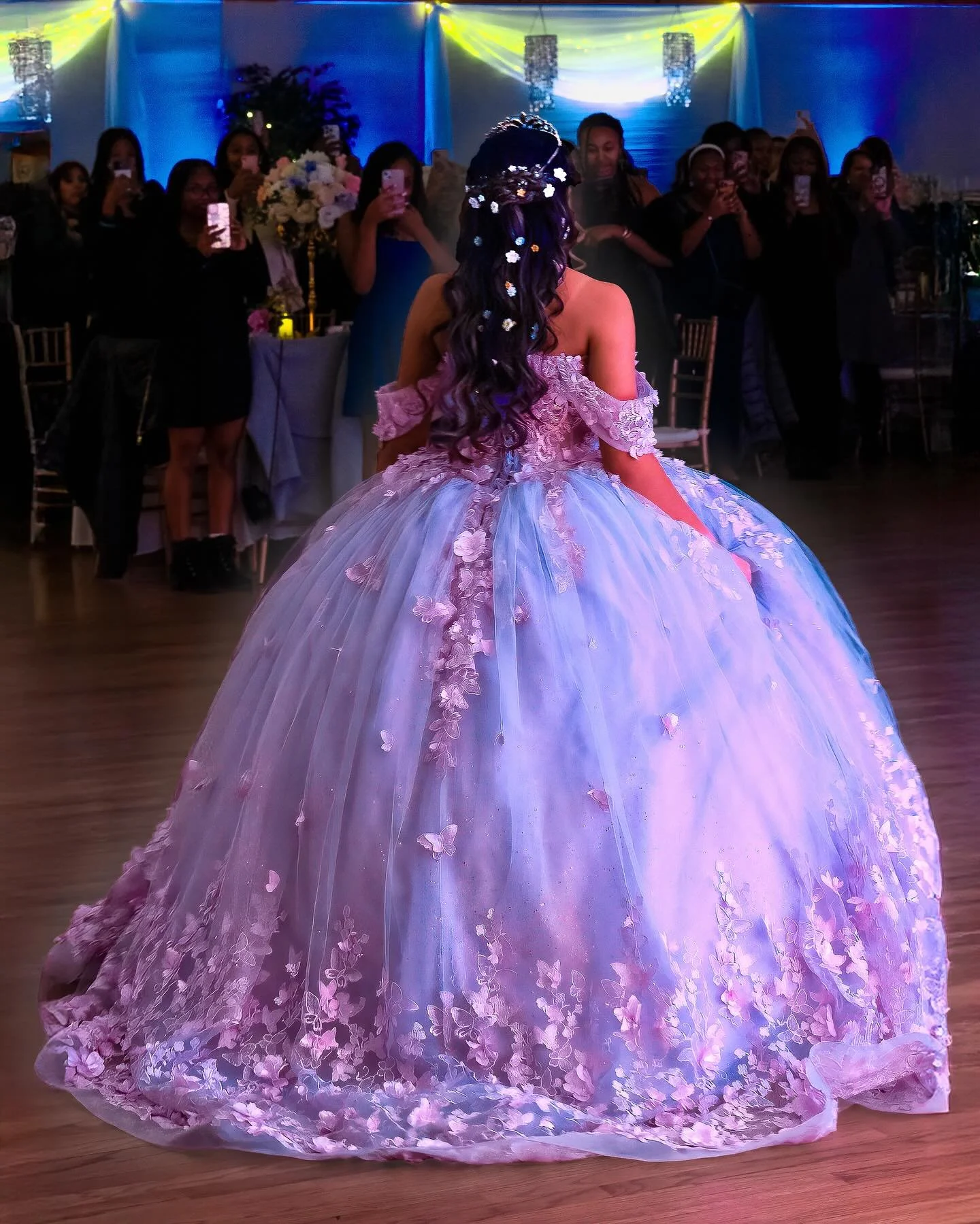 December 13, 2025. Soft layers of lavender and blush up-lighting surround the Cherry Hill Ballroom in a romantic, fog-like glow. While Illuminated floor to ceiling crystal columns sparkle throughout the space, enhancing the backdrop draping, creating