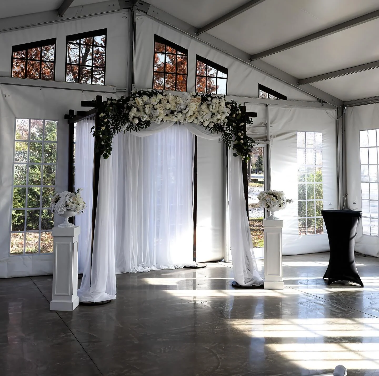 November 14, 2025. The ballroom is set in emerald and gold, ready for a celebration with timeless elegance. Sunlight and shadows with The Arbor oak trees showing their stunning red leaves thru the windows. #cherryhillpark #cherryhillballroom #marylan