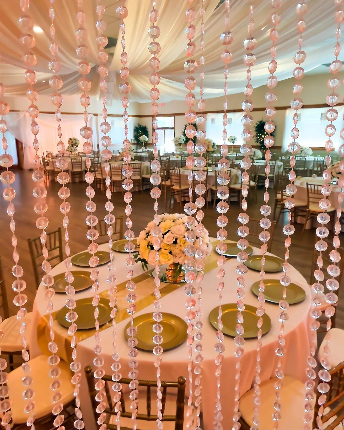Friday night engagement party in the Cherry Hill Ballroom: Shimmering gold lighting and accents create a festive atmosphere to bring together the families and friends of the recently engaged couple to celebrate the joy that lies ahead.