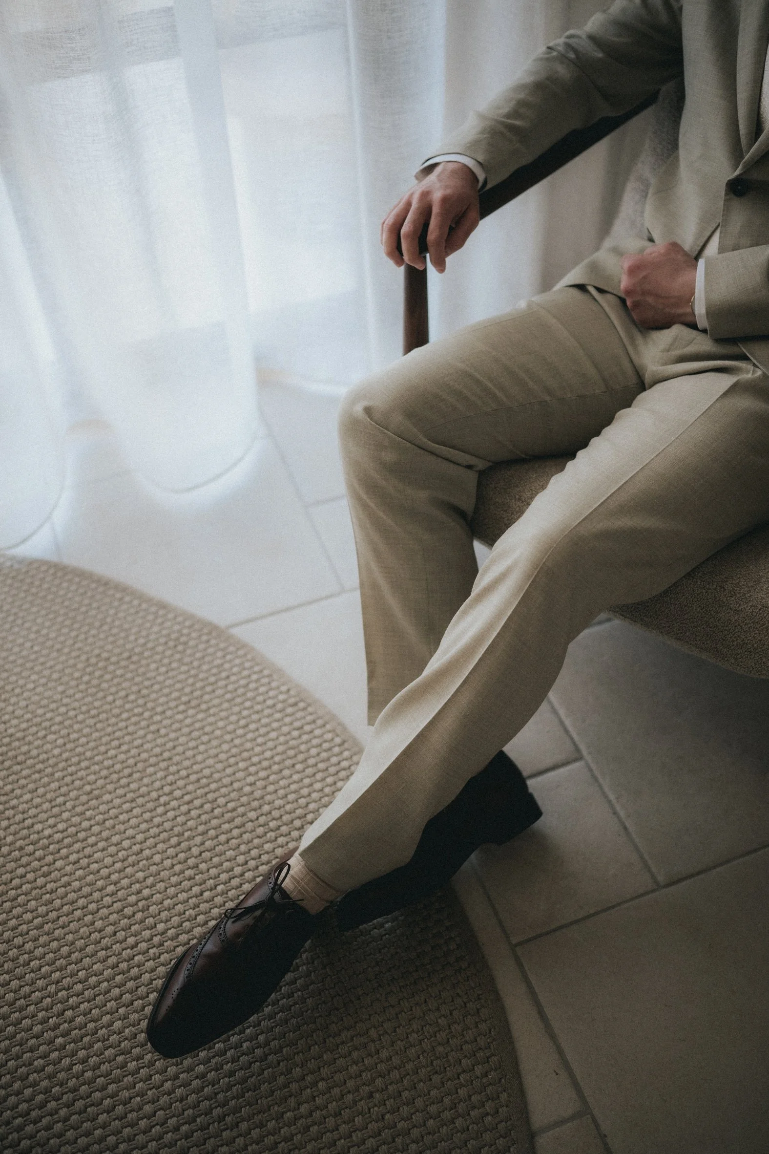 Groom getting ready at the Elysium Hotel